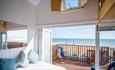 open planned beach lodge that goes onto the deck