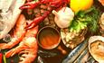 close up shot showing the juicy fresh selection of crayfish, prawns and other seafood